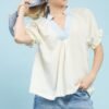 umgee textured v neck top with lace trim details