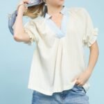 umgee textured v neck top with lace trim details