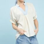umgee textured v neck top with lace trim details