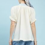 umgee textured v neck top with lace trim details